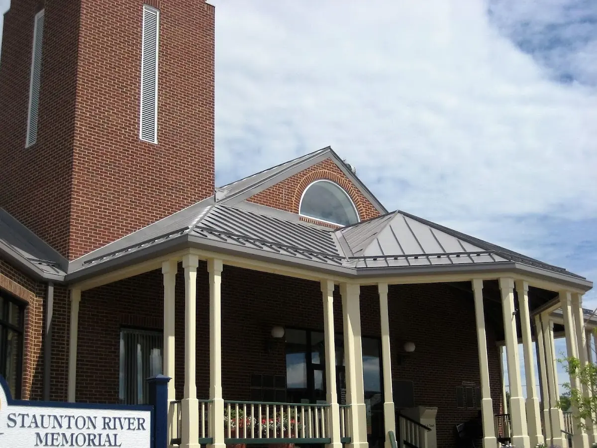 Skilled roofing craftsmen working on a residential roof in Sassamansville